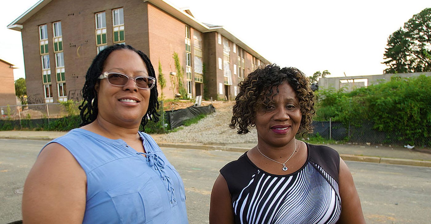 Cynthia Eaglin and Rufaro Jenkins in front of their former home at Parkway Overlook Apartments in Washington, D.C.