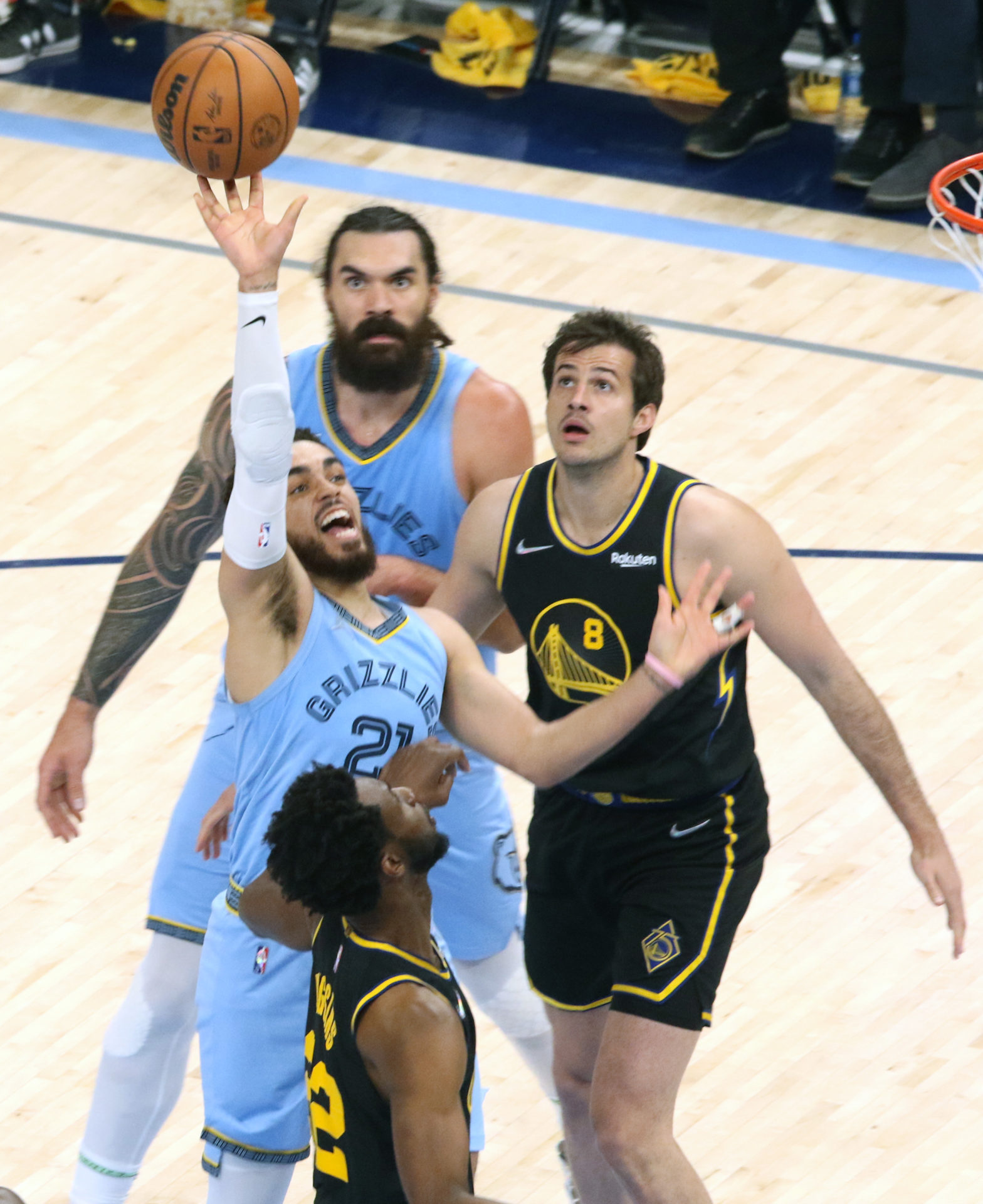 Tyus Jones of the Grizzlies is fouled by Golden States Andrew Wiggins on this drive to the basket. (Photo: Warren Roseborough/The New Tri-State Defender)